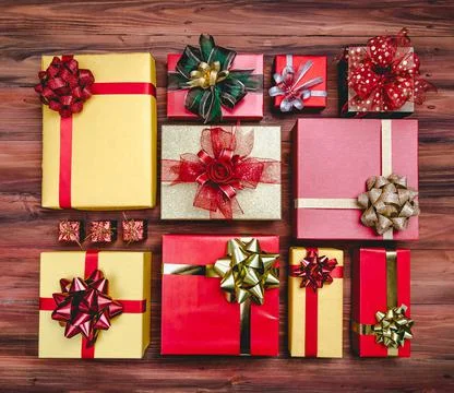 Top view studio shot pattern of colorful paper wrapped present gift boxes wit Stock Photos