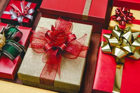 Top view studio shot pattern of colorful paper wrapped present gift boxes wit Stock Photos