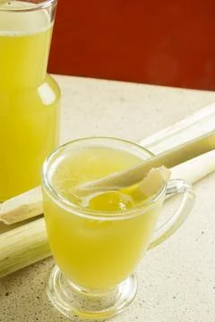 Top view of sugar cane drink on granite table Stock Photos
