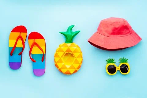 Top view summer beach, pool vacation concept with rainbow color flip flops Foto stock