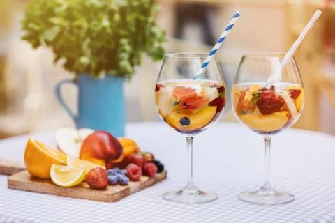 Top view of summer dinks, fruit cocktails on white wood table wi Stock Photos