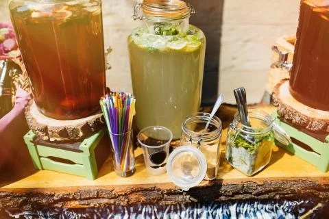 Top view of summer dinks, fruit cocktails on white wood table wi Stock Photos