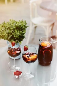 Top view of summer dinks, fruit cocktails on white wood table wi Stock Photos