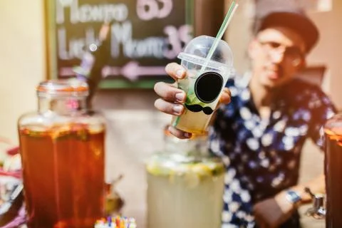 Top view of summer dinks, fruit cocktails on white wood table wi Stock Photos
