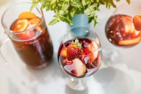 Top view of summer dinks, fruit cocktails on white wood table wi Stock Photos