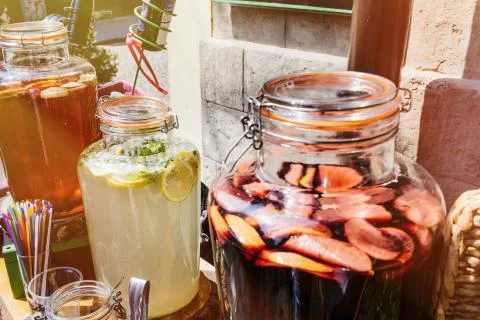 Top view of summer dinks, fruit cocktails on white wood table wi Stock Photos