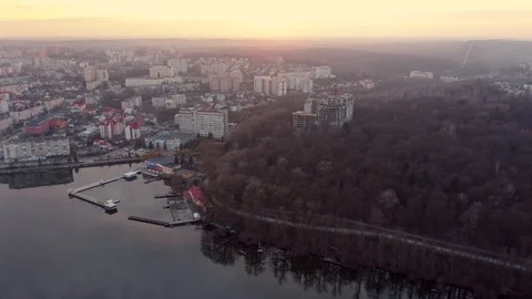 Top view of sunset over city near lake. Ternopil, Ukraine. Lake Ternopil. Stock Footage 127019722