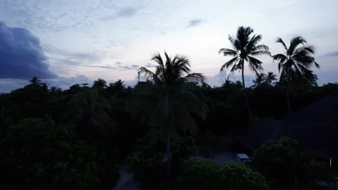 Top view of the sunset over an island in the ocean Video stock 280934420