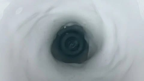Top of view of super slow motion shot of fresh cream white milk vortex Video stock 142439800