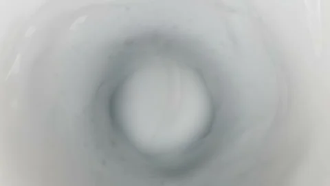 Top of view of super slow motion shot of fresh cream white milk vortex Stock Footage 169577353