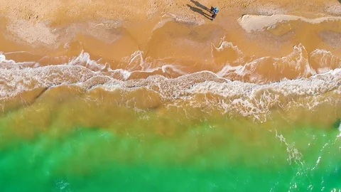 Top view of a superb lonely and deserted beach on the shores of the azure sea. Stock Footage 106947338
