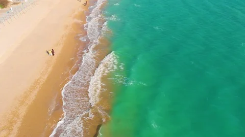 Top view of a superb lonely and deserted beach on the shores of the azure sea. Stock Footage 106948195