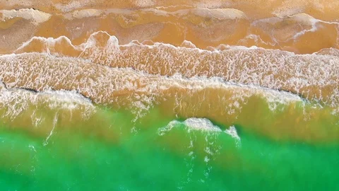 Top view of a superb lonely and deserted beach on the shores of the azure sea. Stock Footage 106949227