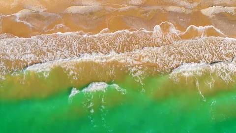 Top view of a superb lonely and deserted beach on the shores of the azure sea. Stock Footage 106950118