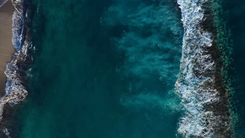 Top view of the surface of the Atlantic Ocean near the coast - waves roll Stock Footage 119473739
