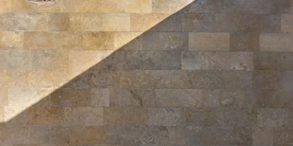 Top view of surface of pedestrian path with paving slabs with the border of l Stock Photos