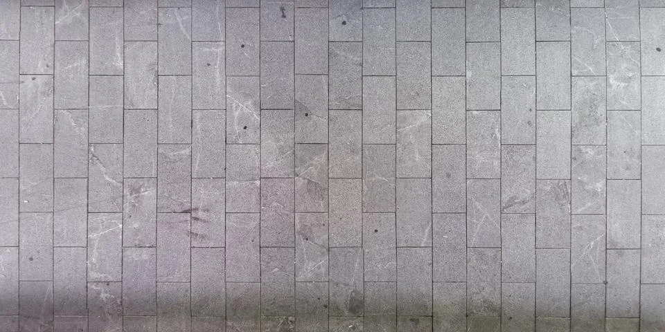 Top view of surface of pedestrian path with paving slabs Stock Photos