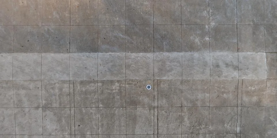 Top view of surface of pedestrian path with paving slabs with the border of l Stock Photos
