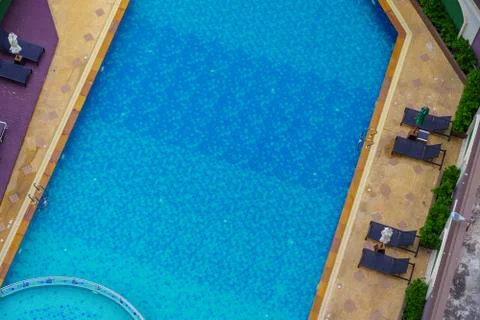 Top view swimming pool at the edge of the pool is wood. Stick with the pool s Stock Photos