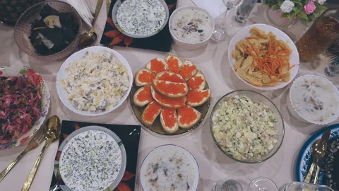 Top view of a table decorated with salads and other festive dishes Stock Footage 146767810
