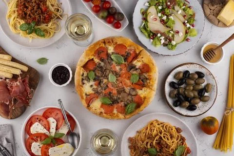 Top-view-table-full-delicious-food-assortment Stock Photos