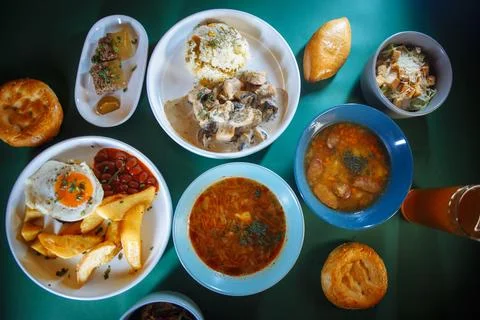 Top view of a table full of delicious traditional russian food with beer and  Stock Photos