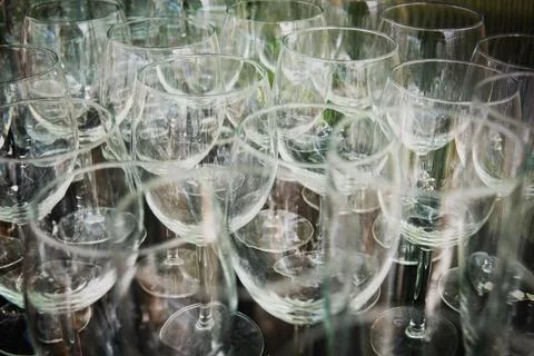 Top view of a table full of empty wine glasses. Wedding party concept. Stock Photos