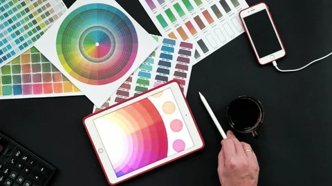 Top view of the table graphic designer, black background Video stock 103587967