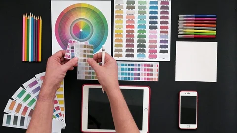 Top view of the table graphic designer, black background Stock Footage 104024301