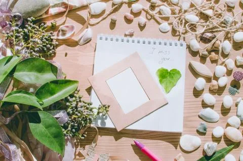 Top view on the table. Note to the Valentine's Day. Spring wallpaper. Stock Photos