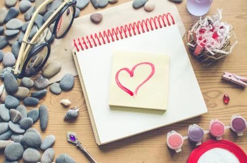 Top view on the table. Note to the Valentine's Day. Heart. Stock Photos