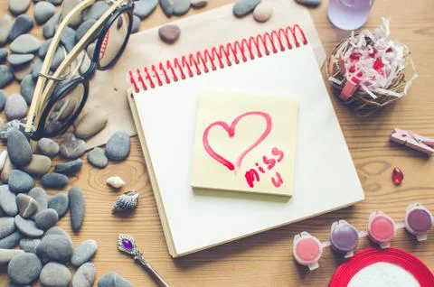 Top view on the table. Note to the Valentine's Day. Stock Photos