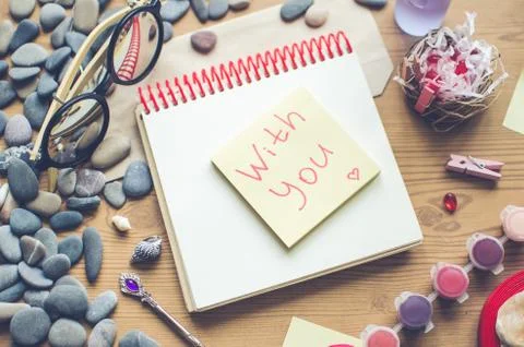 Top view on the table. Note With You to the Valentine's Day. Stock Photos