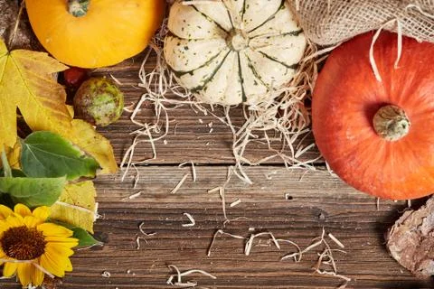 Top view of table with pumpkin and straw Stock Photos