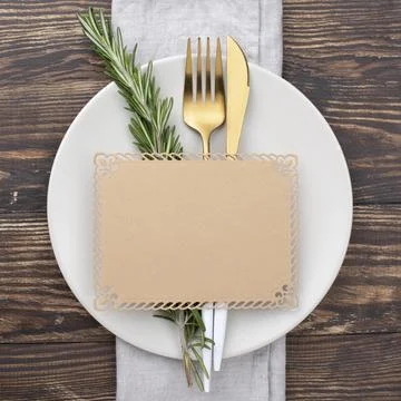 Top view table setting with blank paper sheet Foto stock