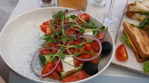 Top view of table setting with fresh vegetable salad Stock Photos