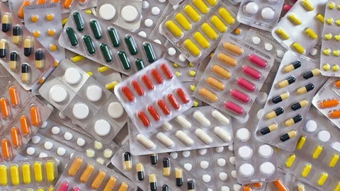 Top view of a tablet blisters fall on the mountain. Stock Footage 72927724