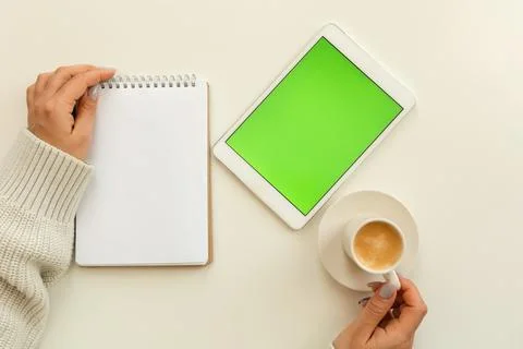Top view of a tablet with a green screen. Stock Photos
