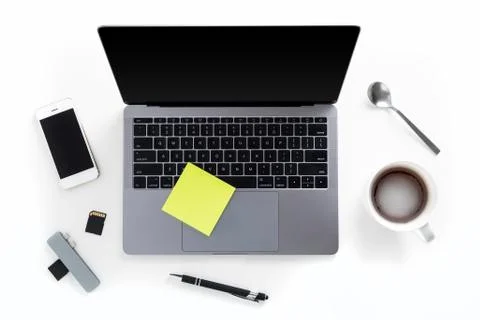 Top view of tabletop with laptop, mobile phone, memory cards, card reader Stock Photos