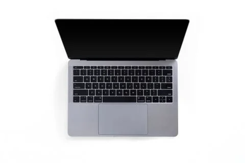 Top view of tabletop with open laptop Stock Photos