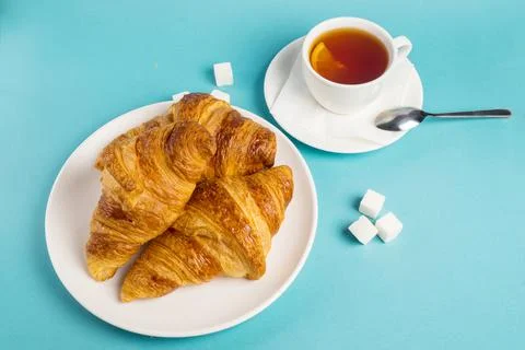 Top view of tasty breakfast with cereal flakes and croissants with coffee Stock Photos