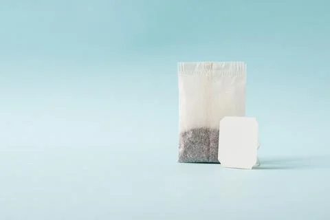 Top view of tea bag on blue background Stock Photos