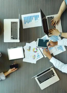 Top view of Technology equipment with tablet, laptop, business documents on m Stock Photos