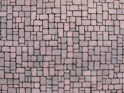 Top view texture of pink and grey concrete cobblestone pavement background Stockfoto's