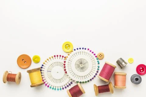 Top view thread with needles buttons 写真素材