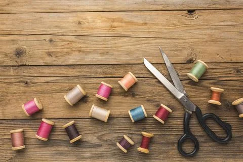 Top view thread with scissors copy space Stock Photos