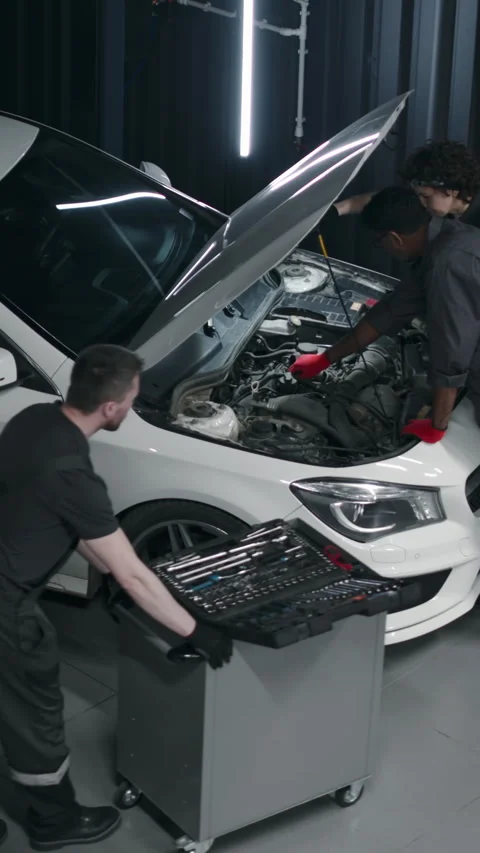 Top View of Three Diverse Mechanics Repa... | Stock Video | Pond5