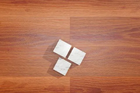 Top view of three marble cubes, cutouts used for product display on a wooden tab Stock Photos