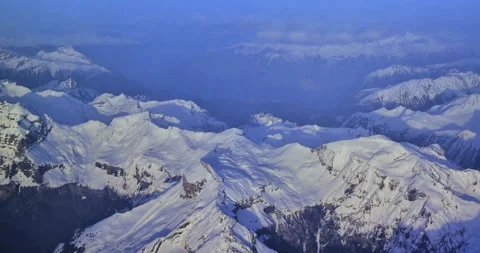 Top view through airplane of mountain ranges with snow of switzerland Stock Footage 269017534
