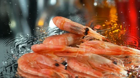 Top view of tiger prawns fall on table with water.Fresh Shrimp. Slow motion , 4k Stock Footage 114970894